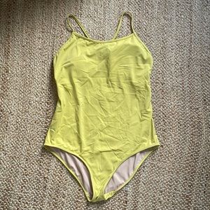 Kortni Jeane yellow one piece bathing suit